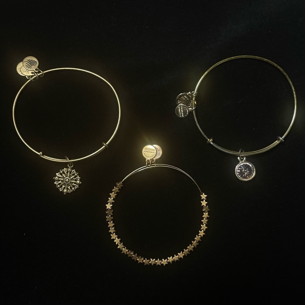 Alex and Ani bronze/gold bracelets with compass, star and pink birth stone charm